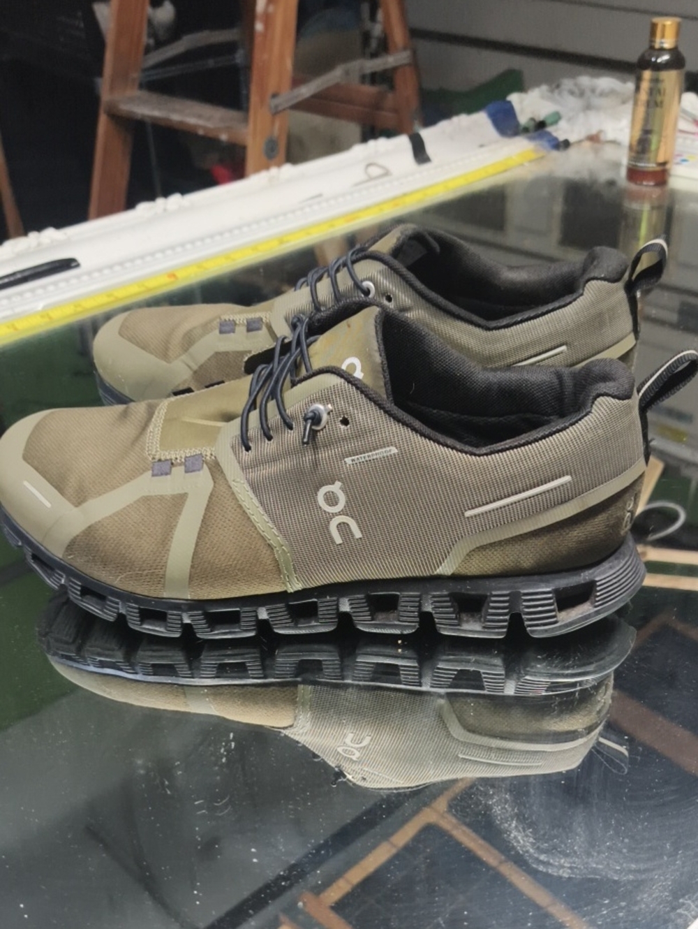 Women's 9.5  On Cloud 5 Waterproof sneaker  Olive Black. Excellent Condition.